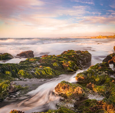 Photo of rocks and tide pools near La Jolla, California. Sunset. Autumn.