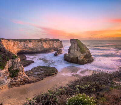 Photo of sunset at Shark Fin Cove near Davenport, California. Spring.