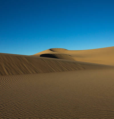 Photo of Mesquite Flat Dunes in the Death Valley.