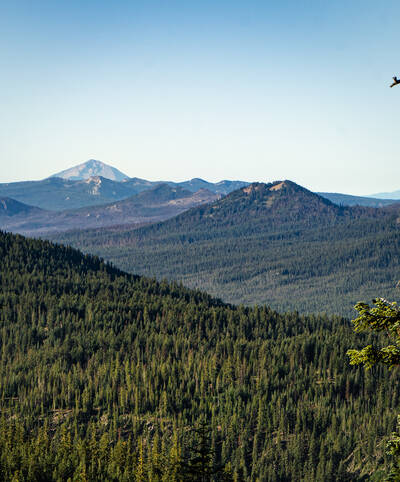 Photo of the crescent moon from Crater Lake National Park. Summer.