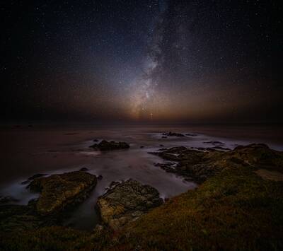 Photo of Milky way over the ocean in Garrapata state park, California. Fall.