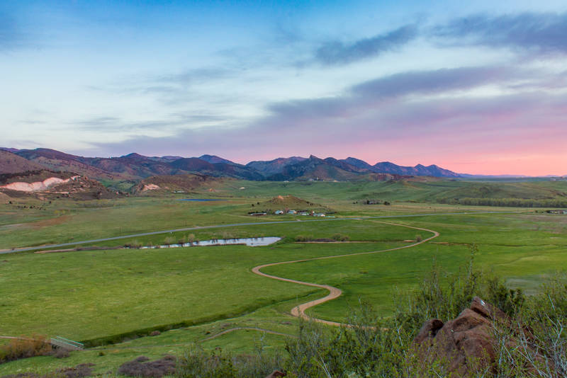 Photo of sand dunes with Monte Cristo mountains in the background.