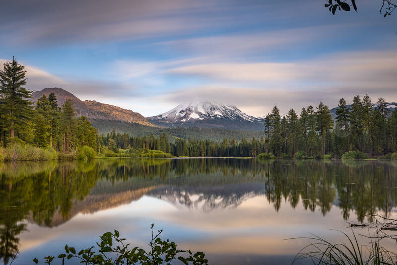 Photo of Lassen Peak from Manzanita Lake after a thunderstorm. Summer.